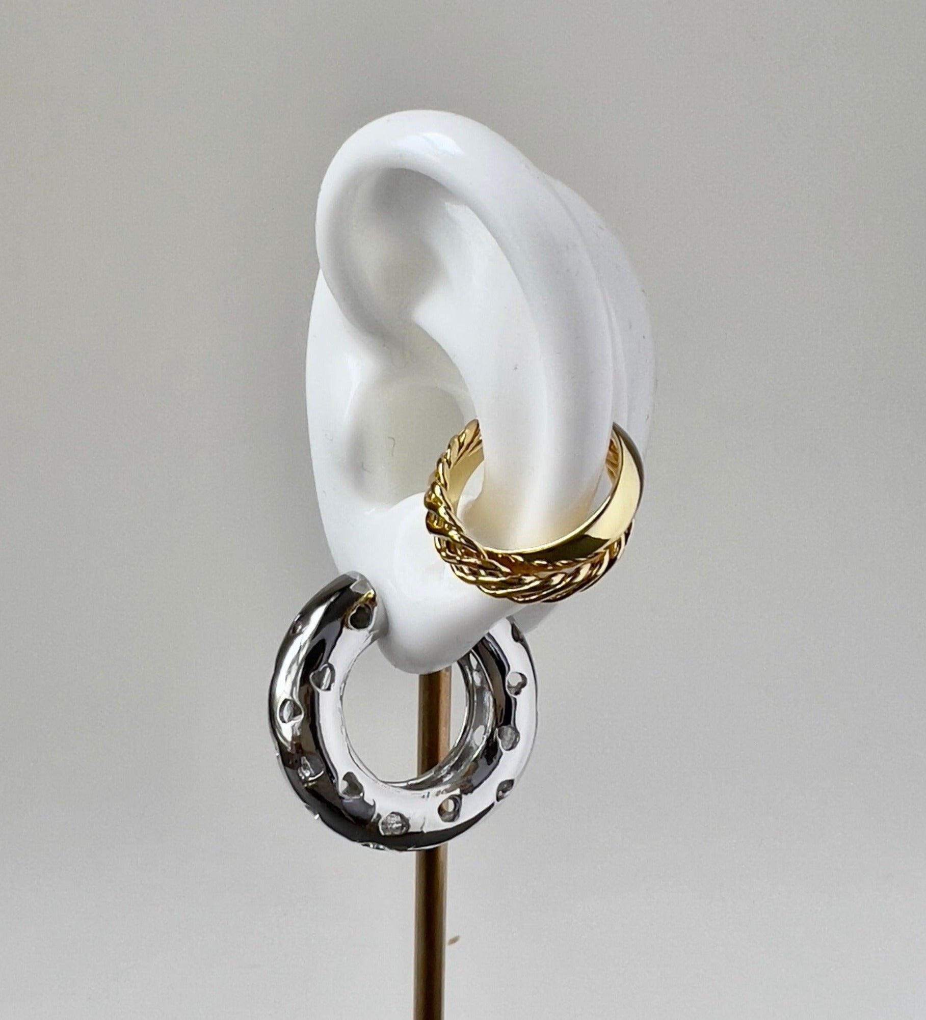 chunky hoop earrings in silver with heart shaped holes