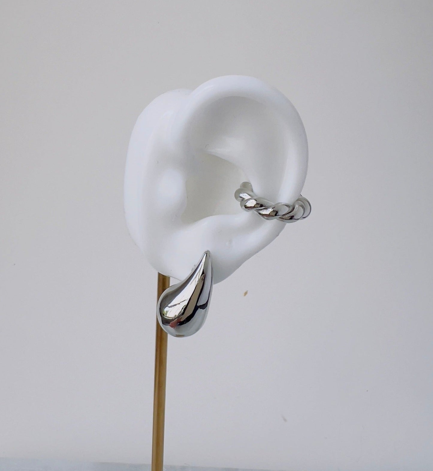 Trendy silver braided ear cuff - Perfect for unpierced ears, offering a fashionable and versatile look