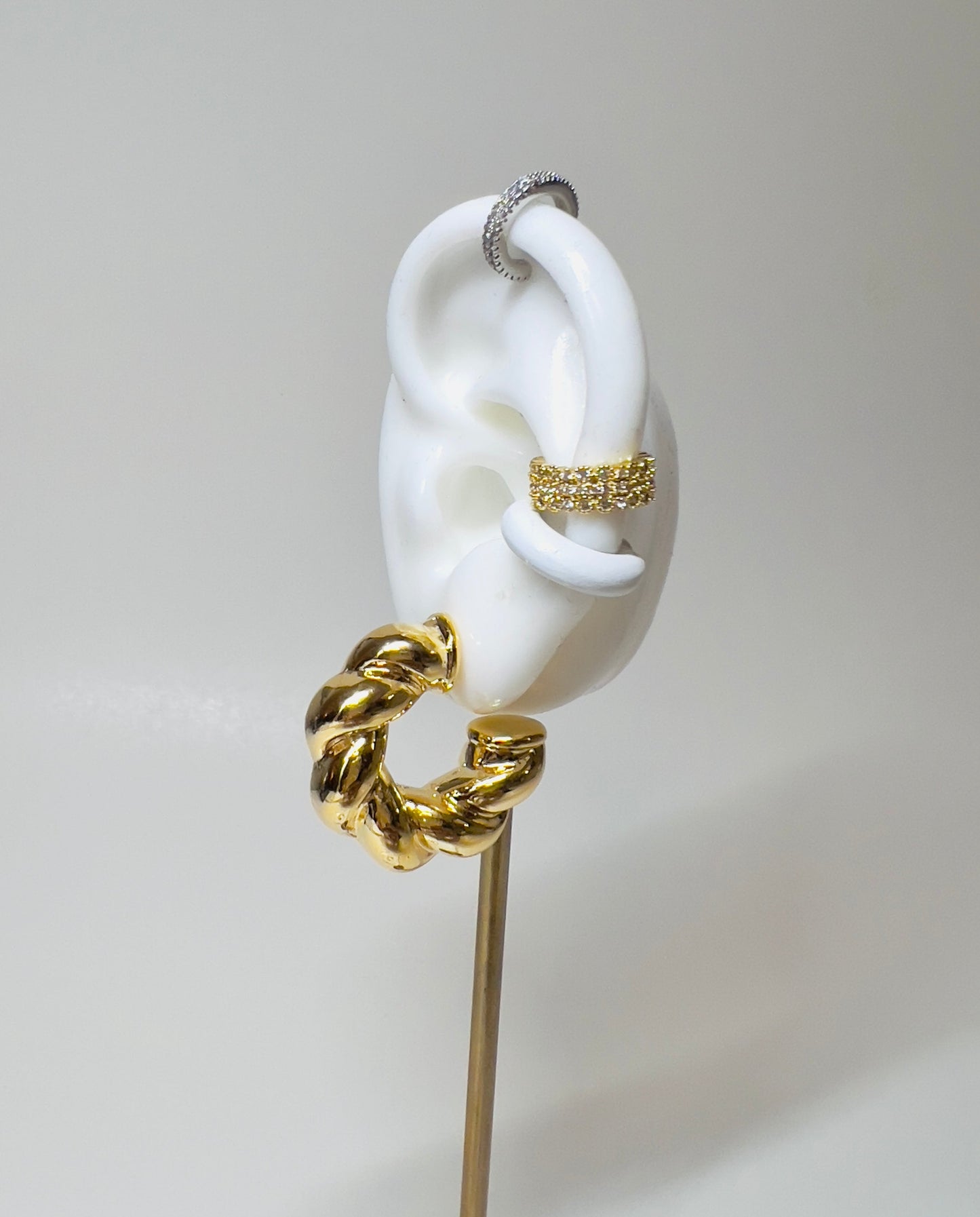 Light rose gold braid shaped hoop earrings