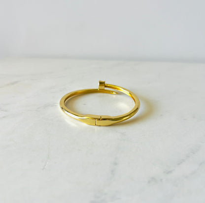 back side of nail shaped gold bangle for women