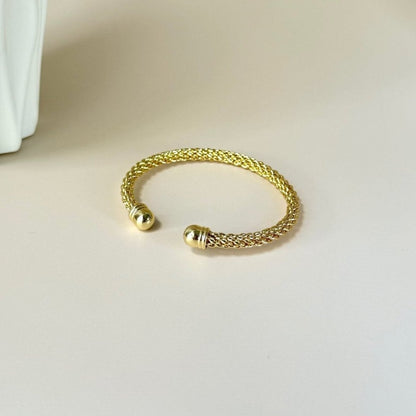 Elegant Classic Royal Wrist Bangle with a sleek, polished gold finish, perfect for adding a touch of sophistication to any outfit.