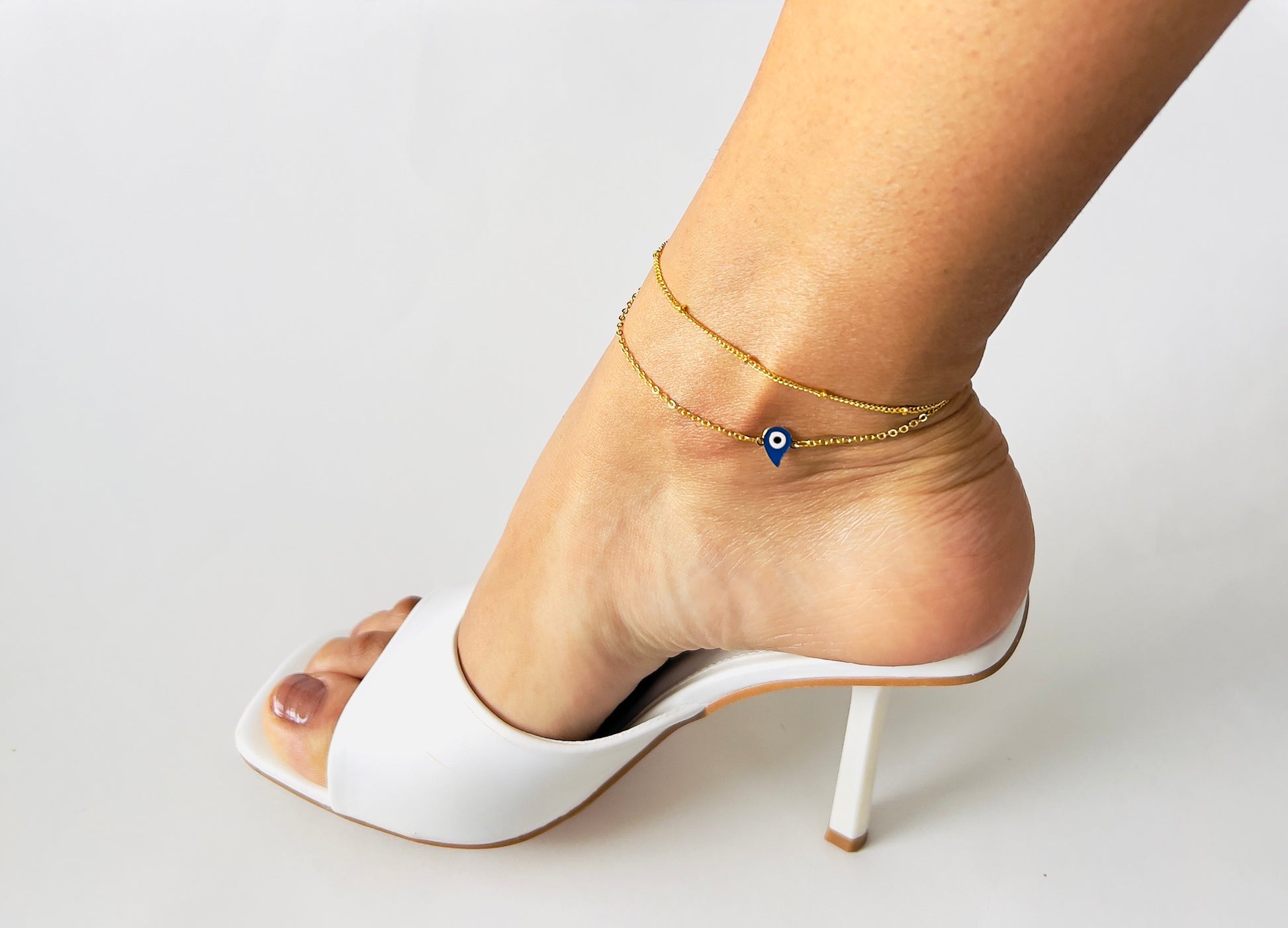 "Mystical Eye of Horus anklet featuring double chain design with large ball and small box chains - Perfect for a boho-chic look"