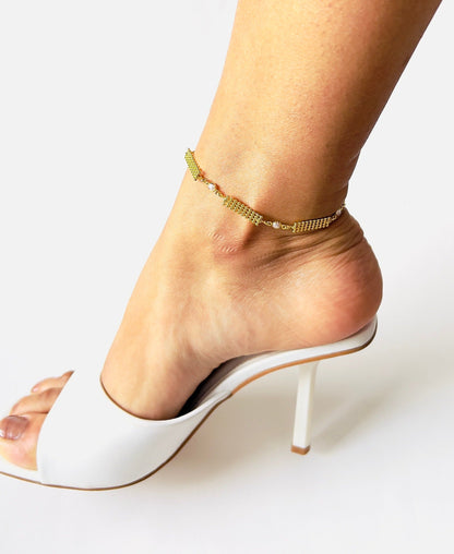 anklet with little bead shapes linked with a pearl