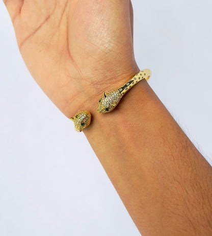 gold bangle with lionesse head in the tip , perfect for egyptian costumes